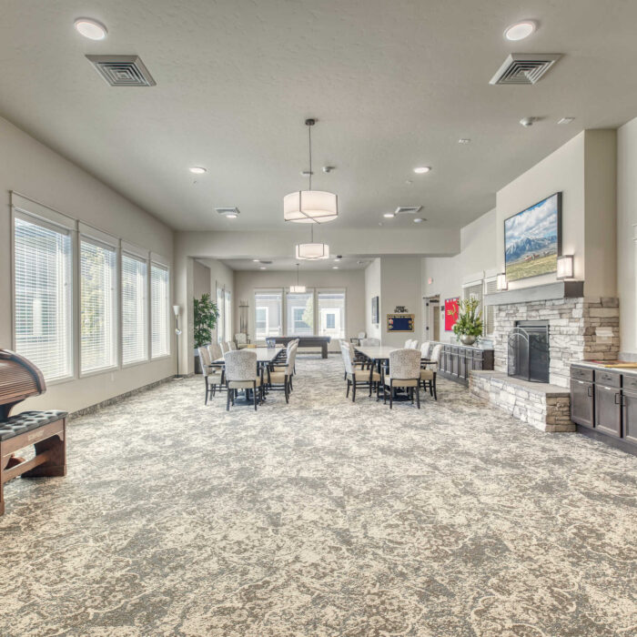 Activity Room with Fireplace and Piano - Grace Assisted Living Fruitland