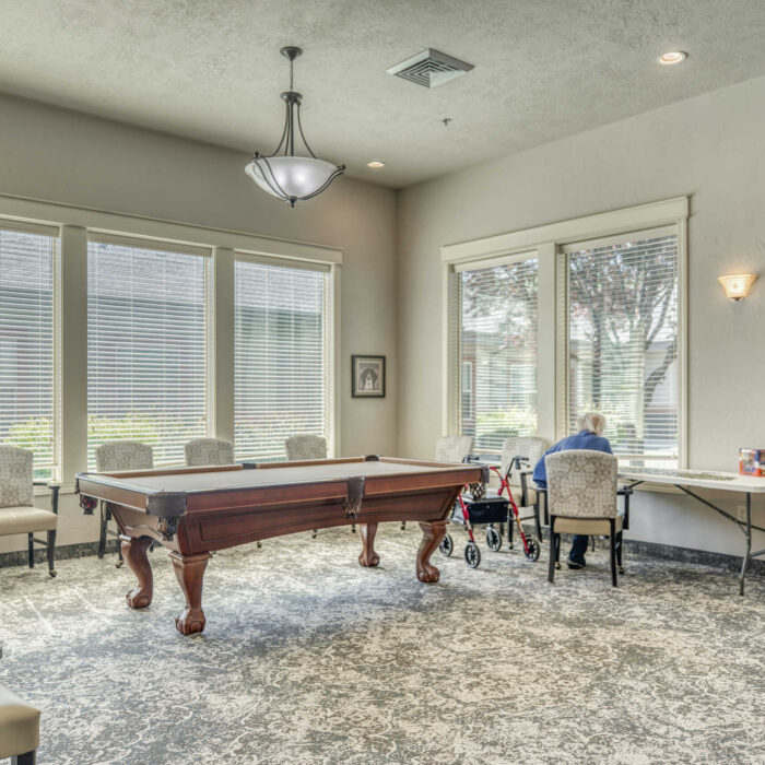 Activity room with billiards at Grace Assisted Living Boise-Eagle
