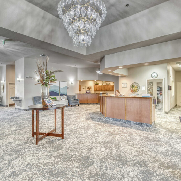 Lobby view with reception and open seating at Grace Assisted Living