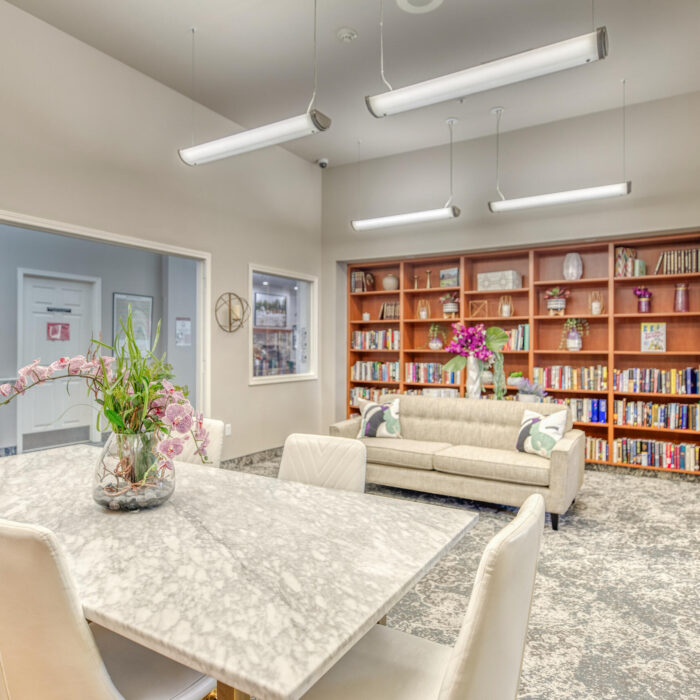 Grace Assisted Living Meridian Library with Marble Table and Bookshelves