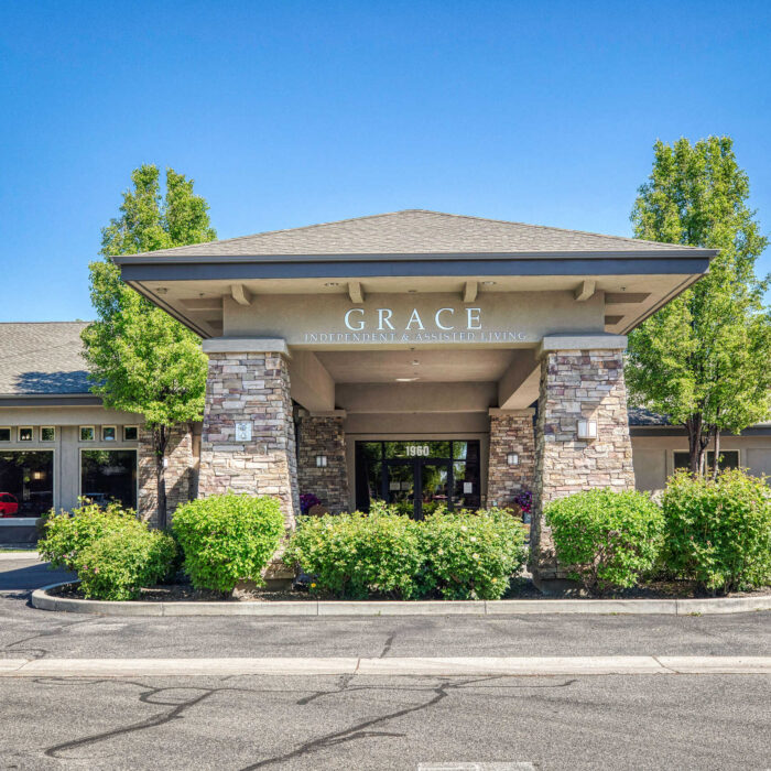 Front exterior showcasing Grace Assisted Living Meridian entrance and signage.