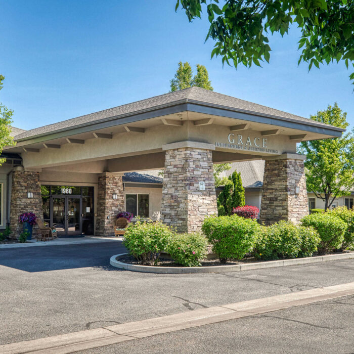 Grace Assisted Living Meridian front entrance with stone columns and green landscaping.