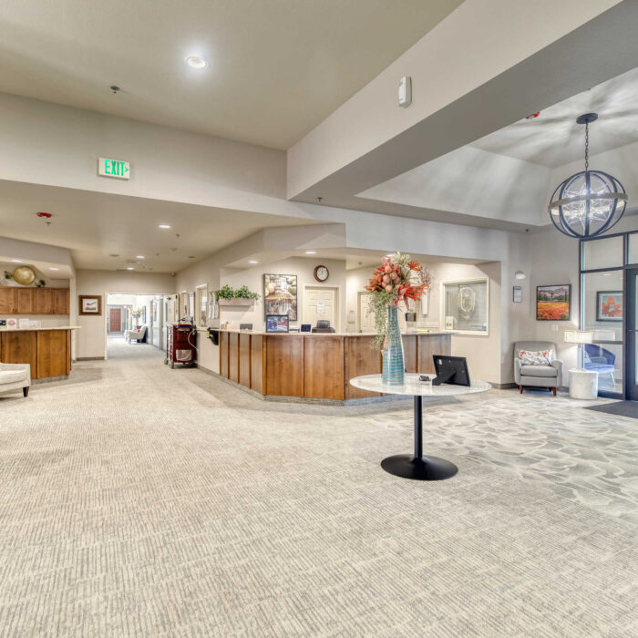 Welcoming lobby area with front desk and decor at Grace Assisted Living Boise