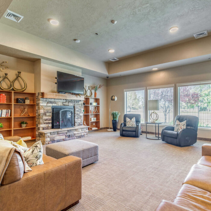 Grace Memory Care Boise-Eagle Lounge with Fireplace and Bookshelves