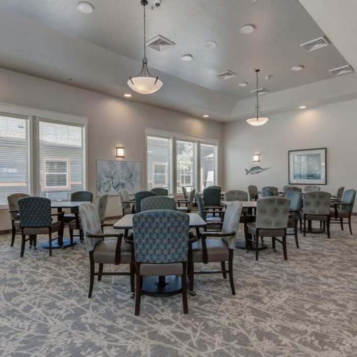 Grace Memory Care Caldwell dining and activity room with piano