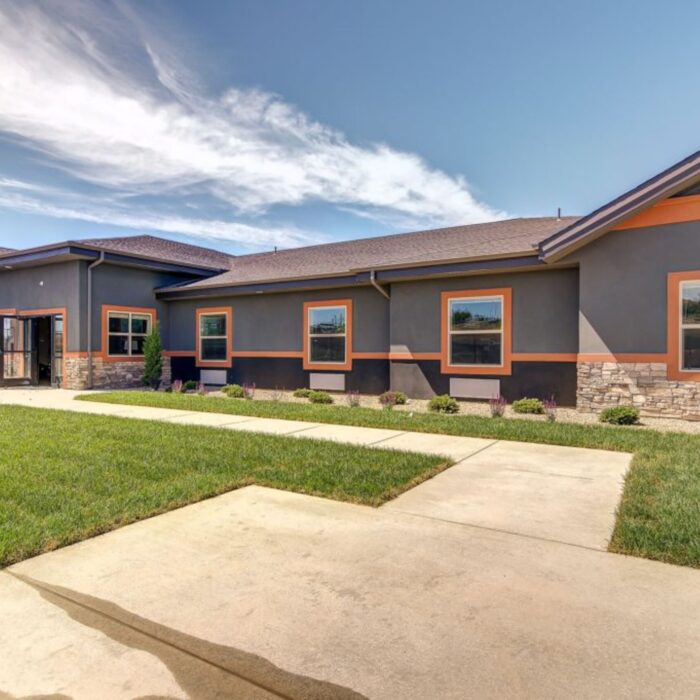 Grace Memory Care Caldwell building exterior and lawn