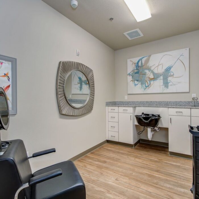 Grace Memory Care Caldwell salon with wash basin and styling chair