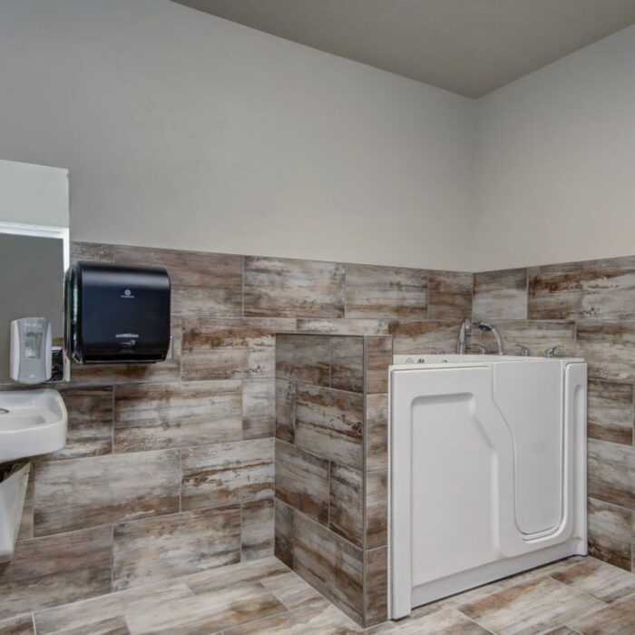 Senior bathroom with walk-in tub at Grace Memory Care Caldwell